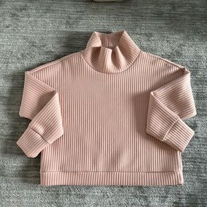Light pink long sleeve cozy scuba high neck top in size medium